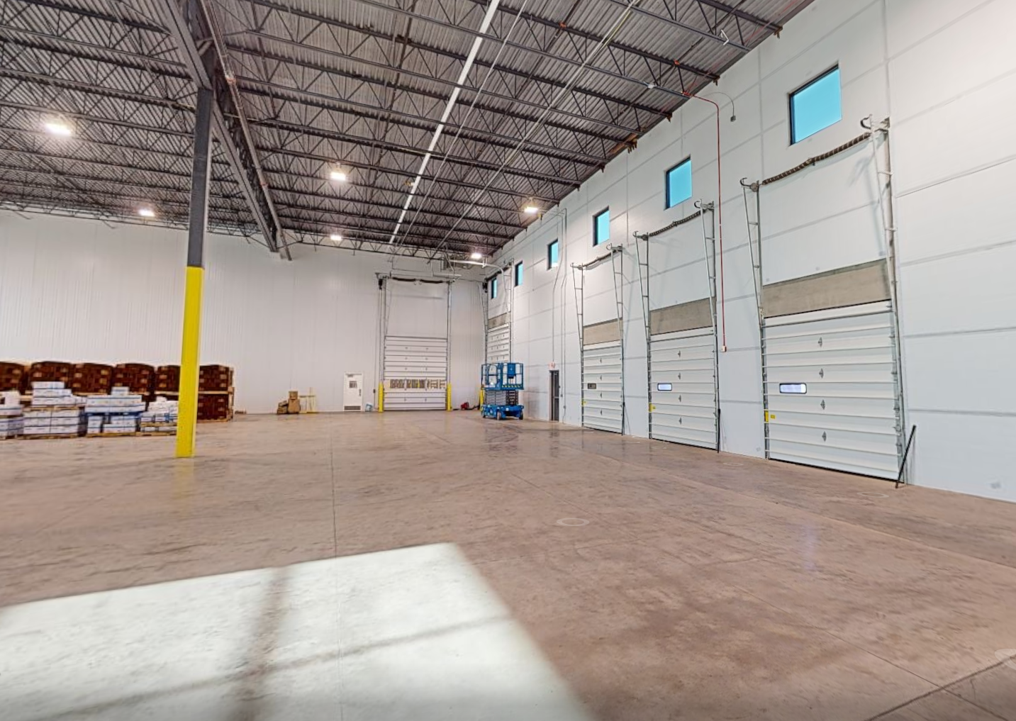 Existing conditions — empty space before construction begins